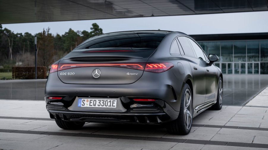 Rear exterior of a gray Mercedes-Benz EQE outside