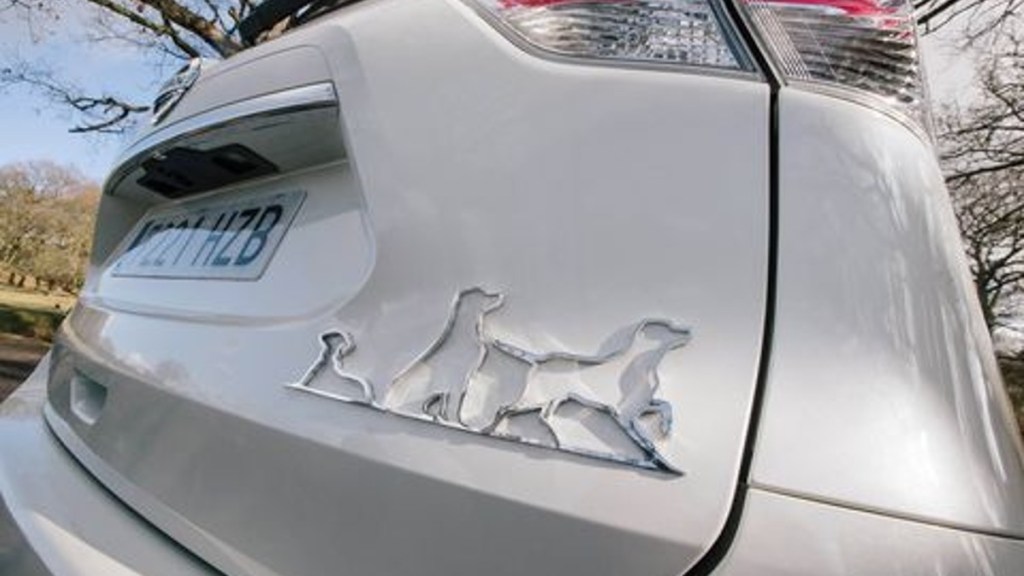 Nissan Rogue X-Trail 4Dogs Emblem on the rear hatch