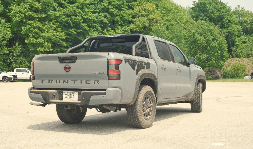 The rear end of the 2023 Nissan Frontier PRO-4X midsize truck.