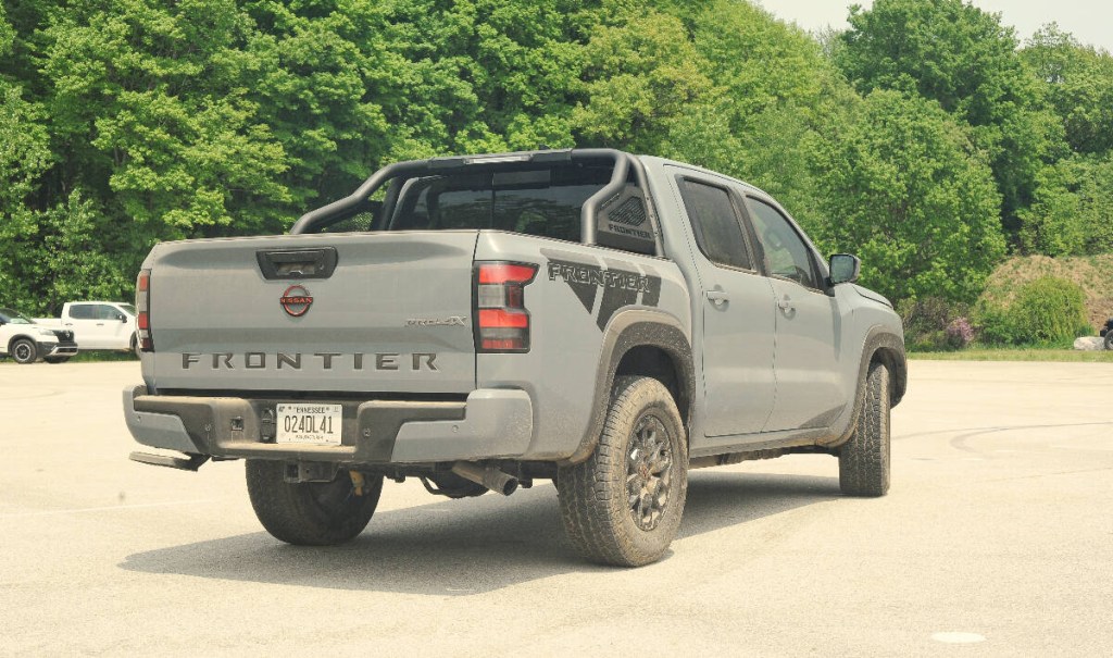 The rear end of the 2023 Nissan Frontier midsize truck.