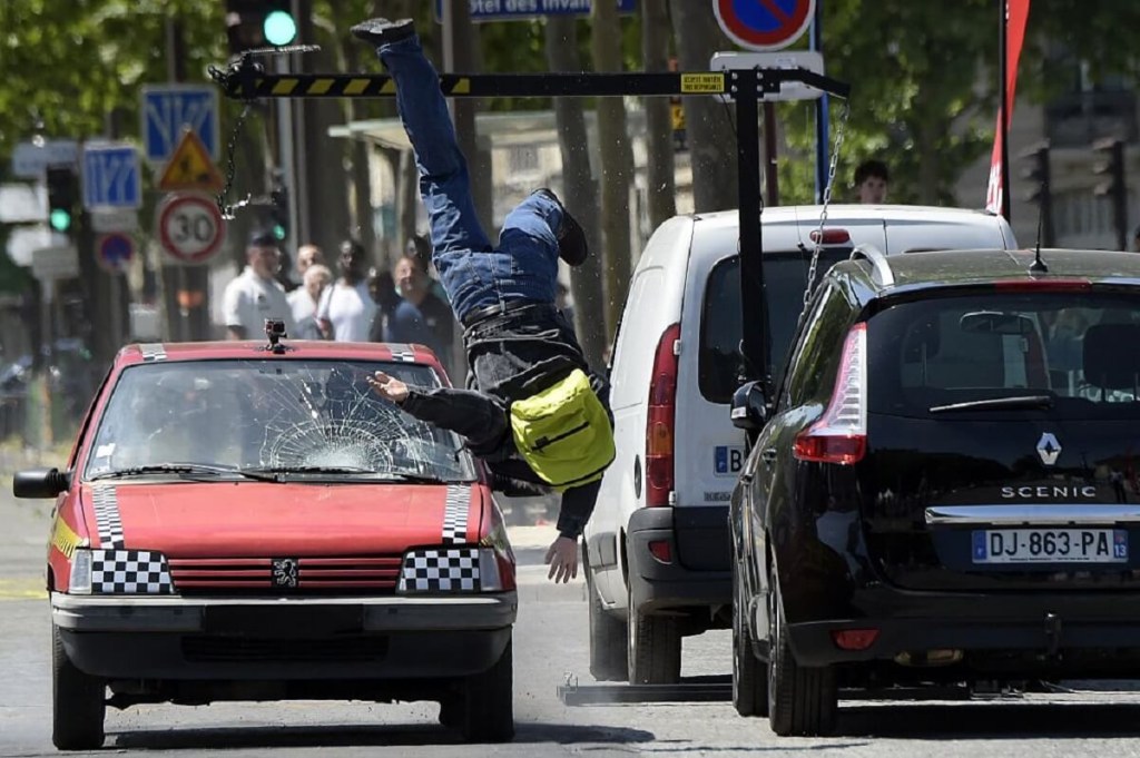 A crash test car runs into a pedestrian in a simulation. 