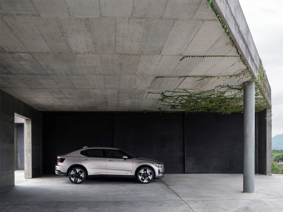 The Polestar 2 parks under an overhang
