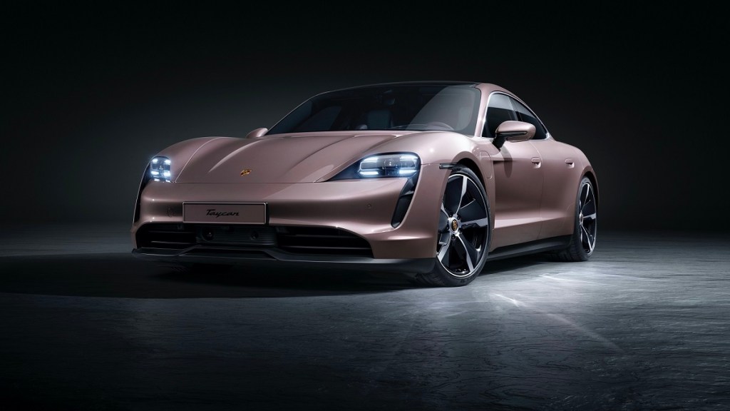 A Porsche Taycan luxury electric car shows off its front-end styling. 