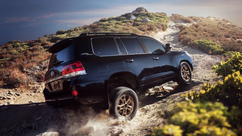 Rear view of black Toyota Land Cruiser, SUV most likely to last 250,000 miles, could return to America
