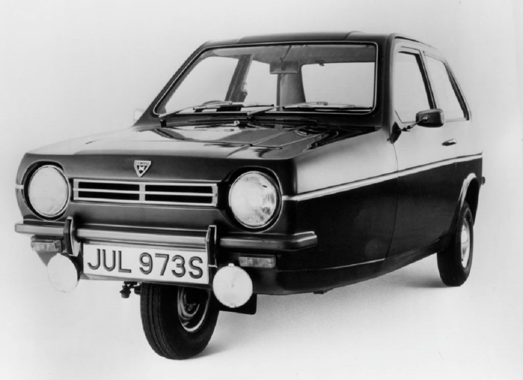 A Reliant Robin shows off its small car, three-wheeled platform. 