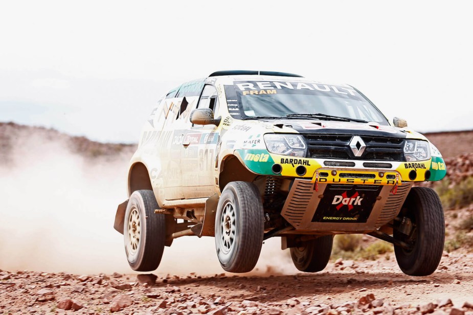 A modified Renault Duster off-road SUV completes a jump during the Dakar rally in Argentina.