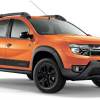 An orange Renault Duster Dakar off-road crossover SUV against a white backdrop.