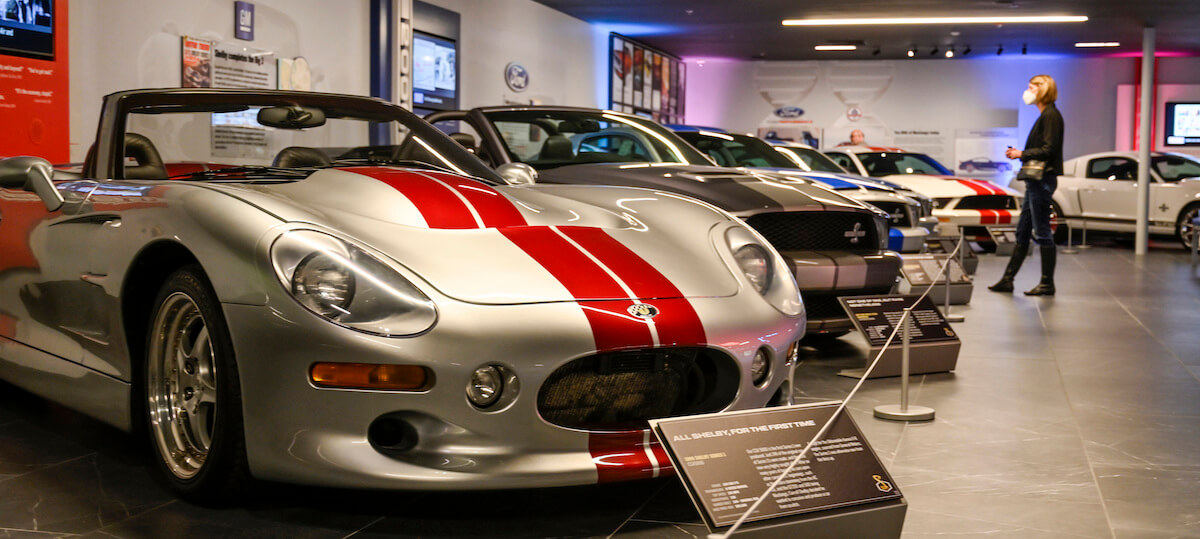 A silver Shelby Series1 in a museum