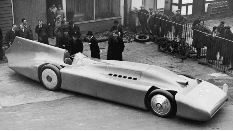 A black and white picture of the Blue Bird, the first car to ever go 300 mph.
