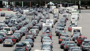 Lines of cars and trucks waiting at toll booths