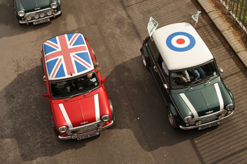 Driving vintage Mini coopers with British flag