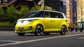 A green 2024 Volkswagen ID. Buzz is parked.