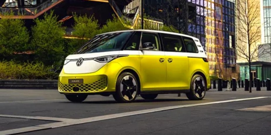 A green 2024 Volkswagen ID. Buzz electric bus is parked. 