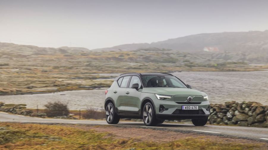 The 2023 Volvo XC40 Recharge in green on a foggy road