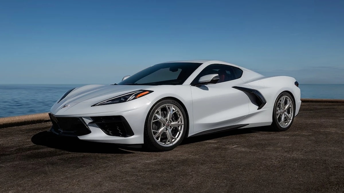 White 2023 Chevy Corvette near ocean, showing cheaper sports car alternatives that cost $28K