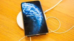 An iPhone using a wireless phone charger.