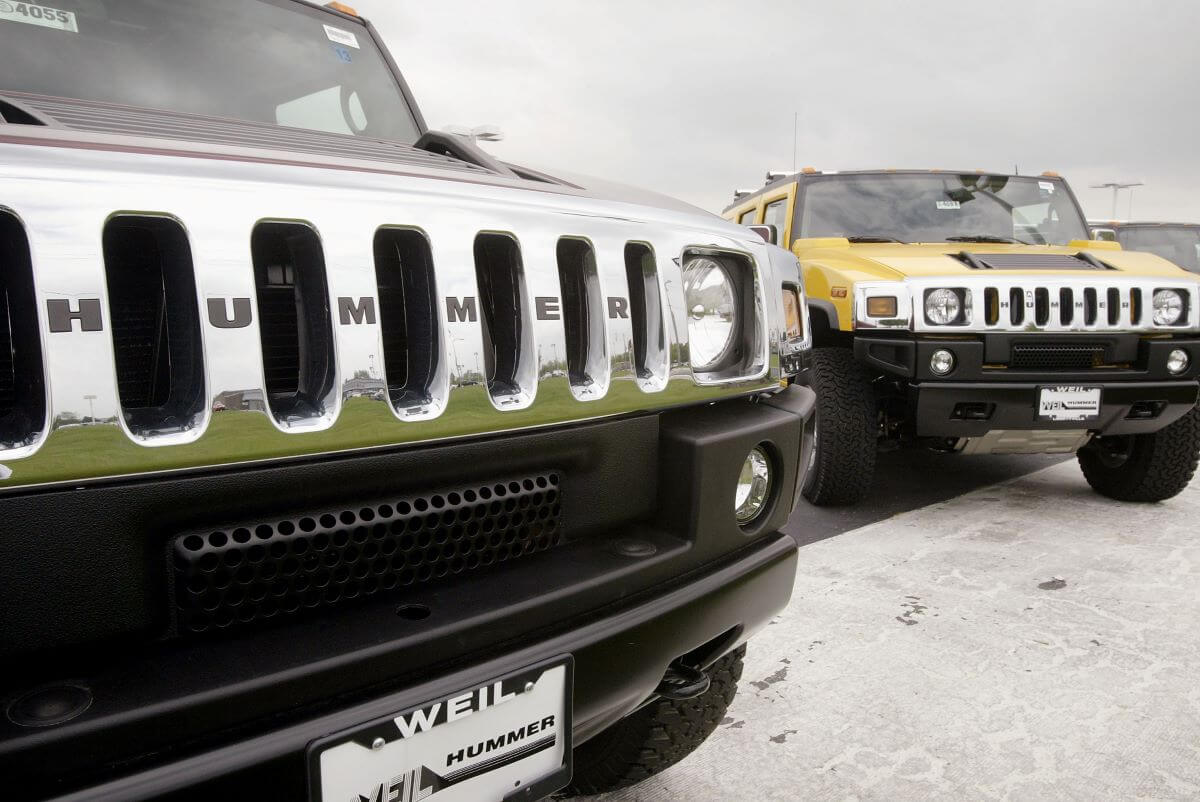 A pair of Hummer H2 large SUV models at the Weil Hummer dealership in Libertyville, Illinois