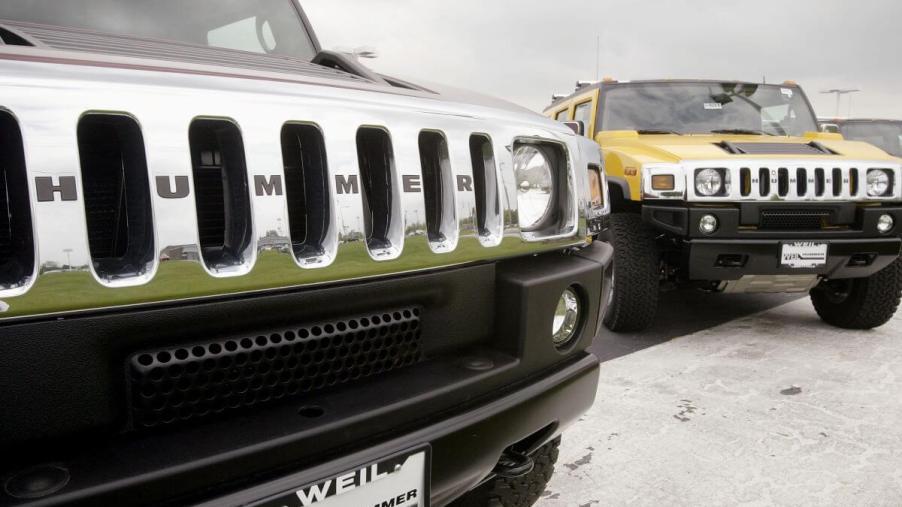 A pair of Hummer H2 large SUV models at the Weil Hummer dealership in Libertyville, Illinois