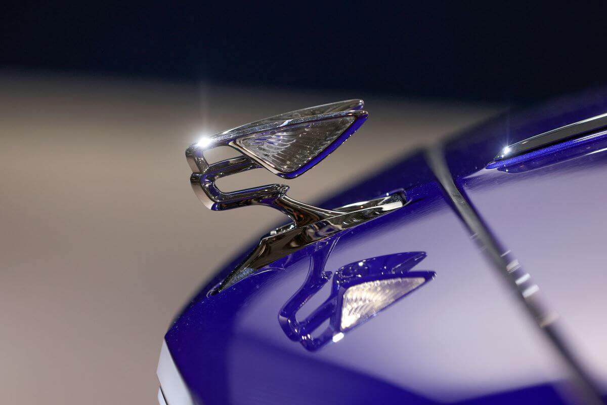 A Bentley Flying Spur winged hood ornament on display at a Volkswagen AG meeting in Berlin, Germany