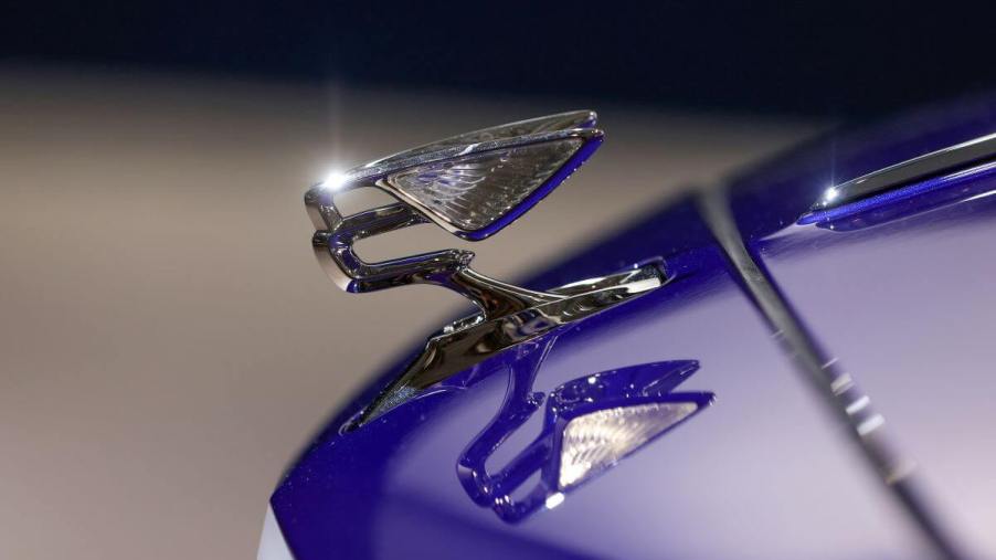 A Bentley Flying Spur winged hood ornament on display at a Volkswagen AG meeting in Berlin, Germany