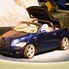 A Chrysler PT Cruiser convertible prototype compact car model on display at the 2001 New York Auto Show
