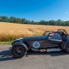A grey caterham seven driven in a rally