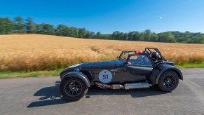 A grey caterham seven driven in a rally