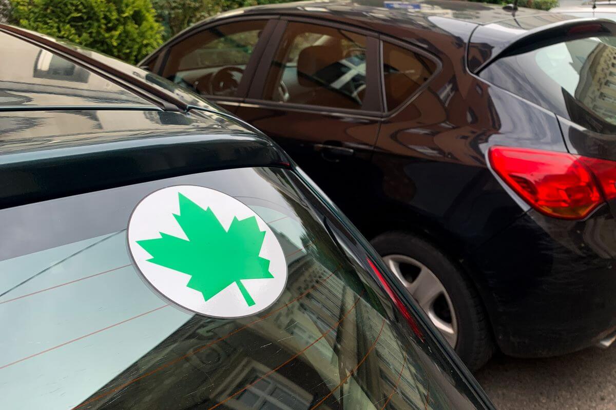 A green leaf sticker, symbolic of the Green Choice Consumer Reports program, seen in Krakow, Poland