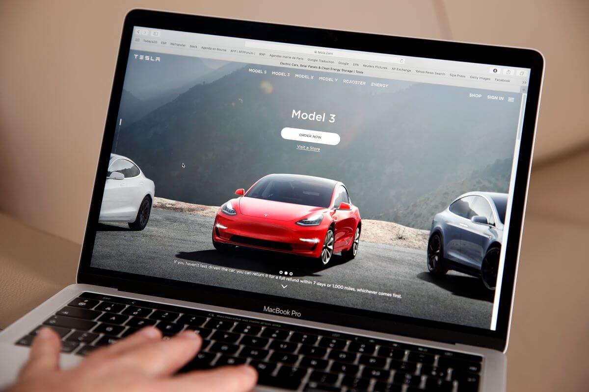 Browsing the Tesla Model names while car shopping online at the Tesla website