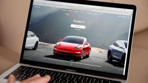 Browsing the Tesla Model names while car shopping online at the Tesla website