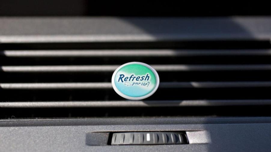 A Refresh brand car air freshener attached to a vent inside a vehicle in Tiskilwa, Illinois
