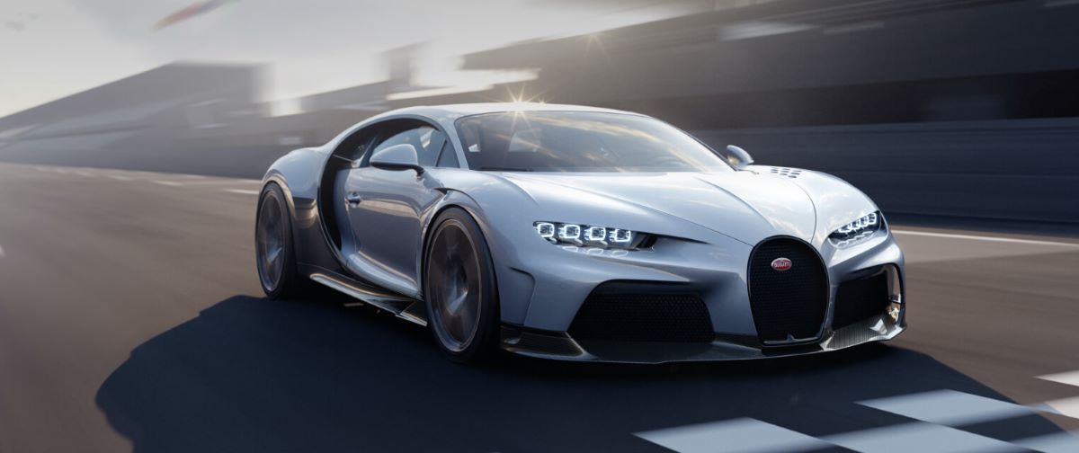 A silver-gray Bugatti Chiron Super Sport mid-engine performance-focused sports car coupe model on a racetrack