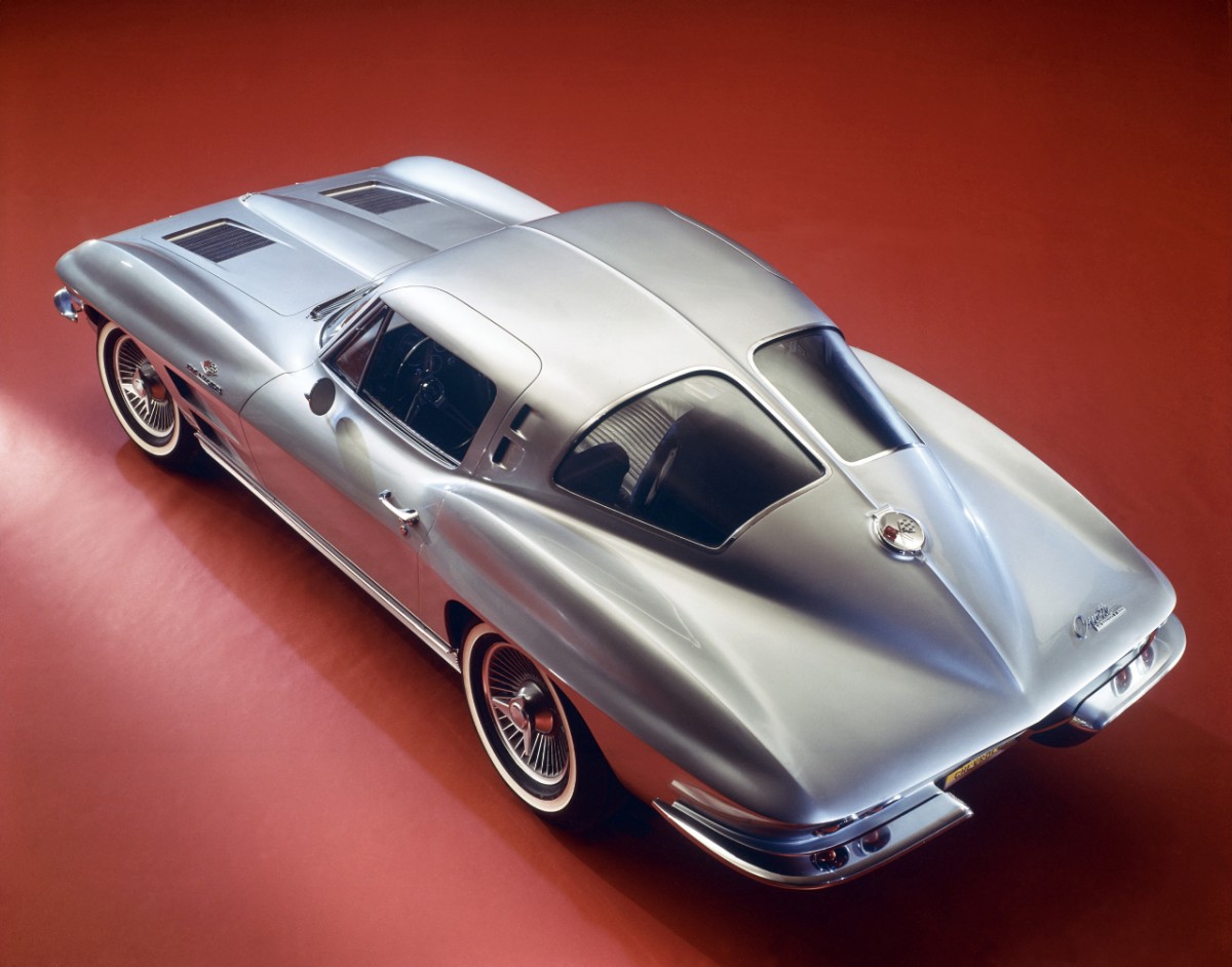A silver 1963 Chevrolet Corvette C2 shows off its split window design.