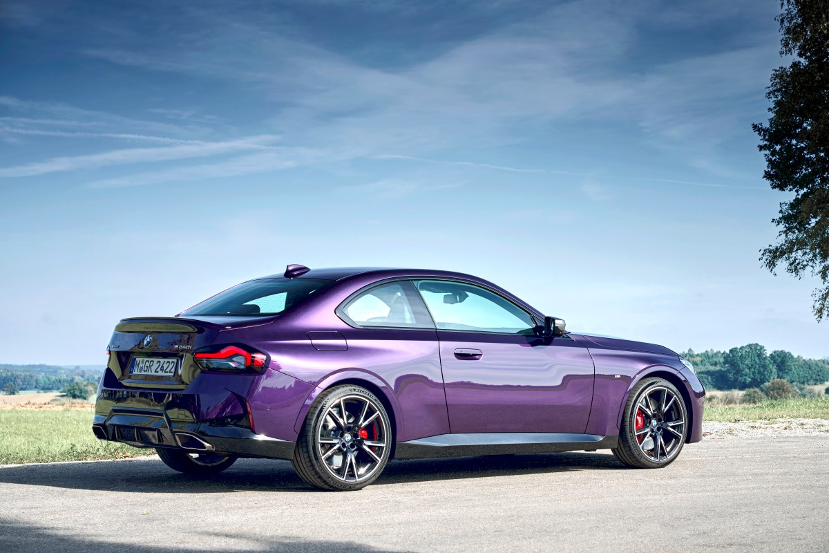 A purple BMW 2 Series Coupe from the rear