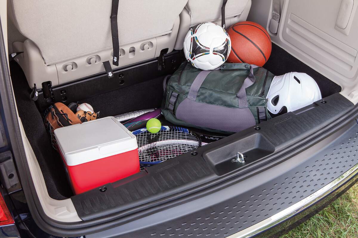 2020 Dodge Grand Caravan cargo space shows a cooler, helpful while driving during a heat wave.