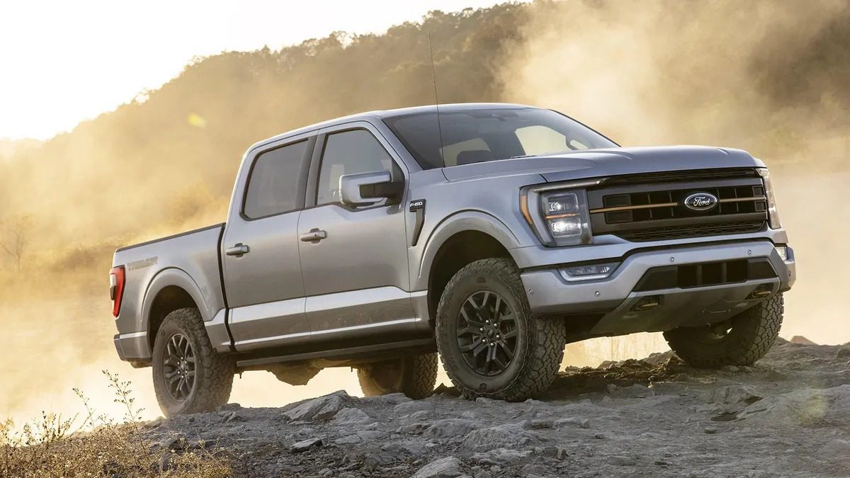 The 2023 Ford F-150 off--roading over rocks