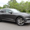 The 2023 Genesis Electrified GV70 parked outside on a cloudy day