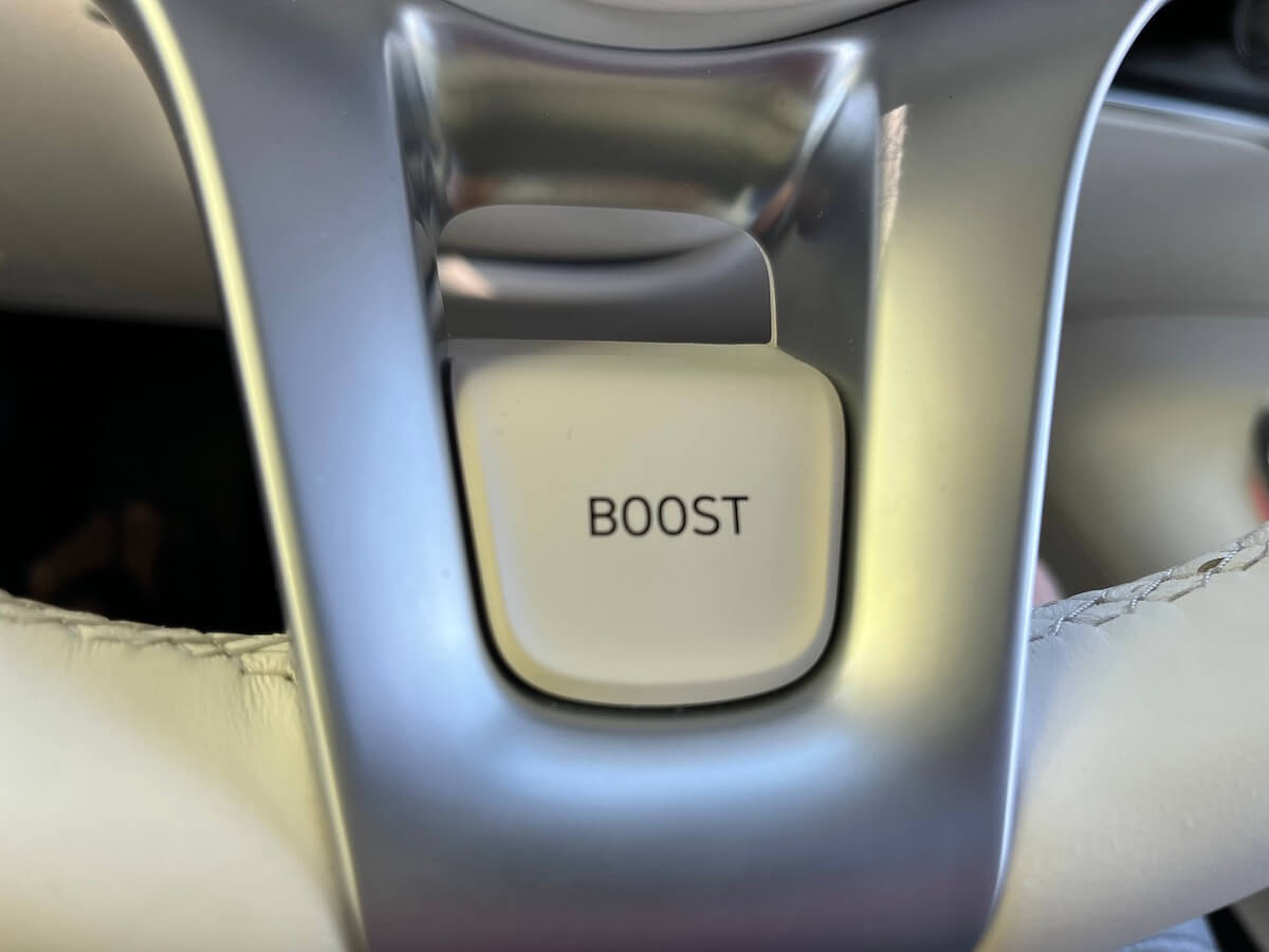 The Boost button at the bottom of the 2023 Genesis Electrified GV70