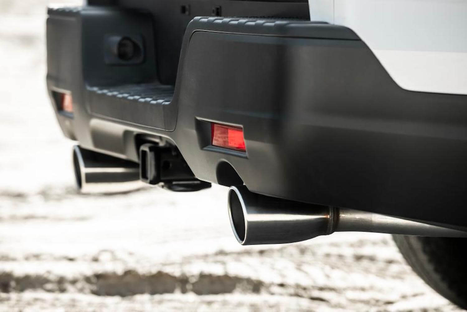 The exhaust pipes of the 2023 Honda Ridgeline HPD tuned pickup truck.