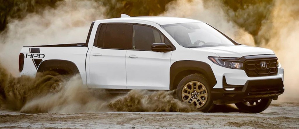 The 2023 Honda Ridgeline off-roading in sand
