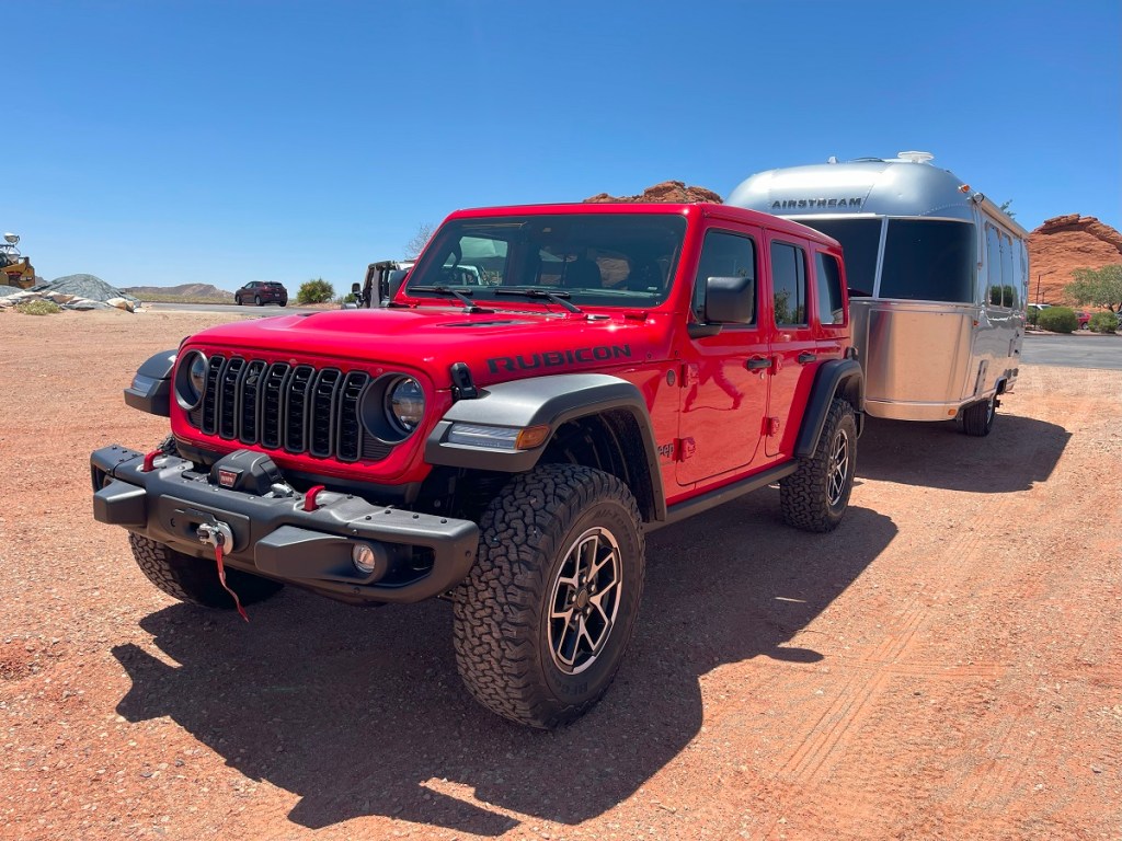 The 2024 Jeep Wrangler towing a camper 