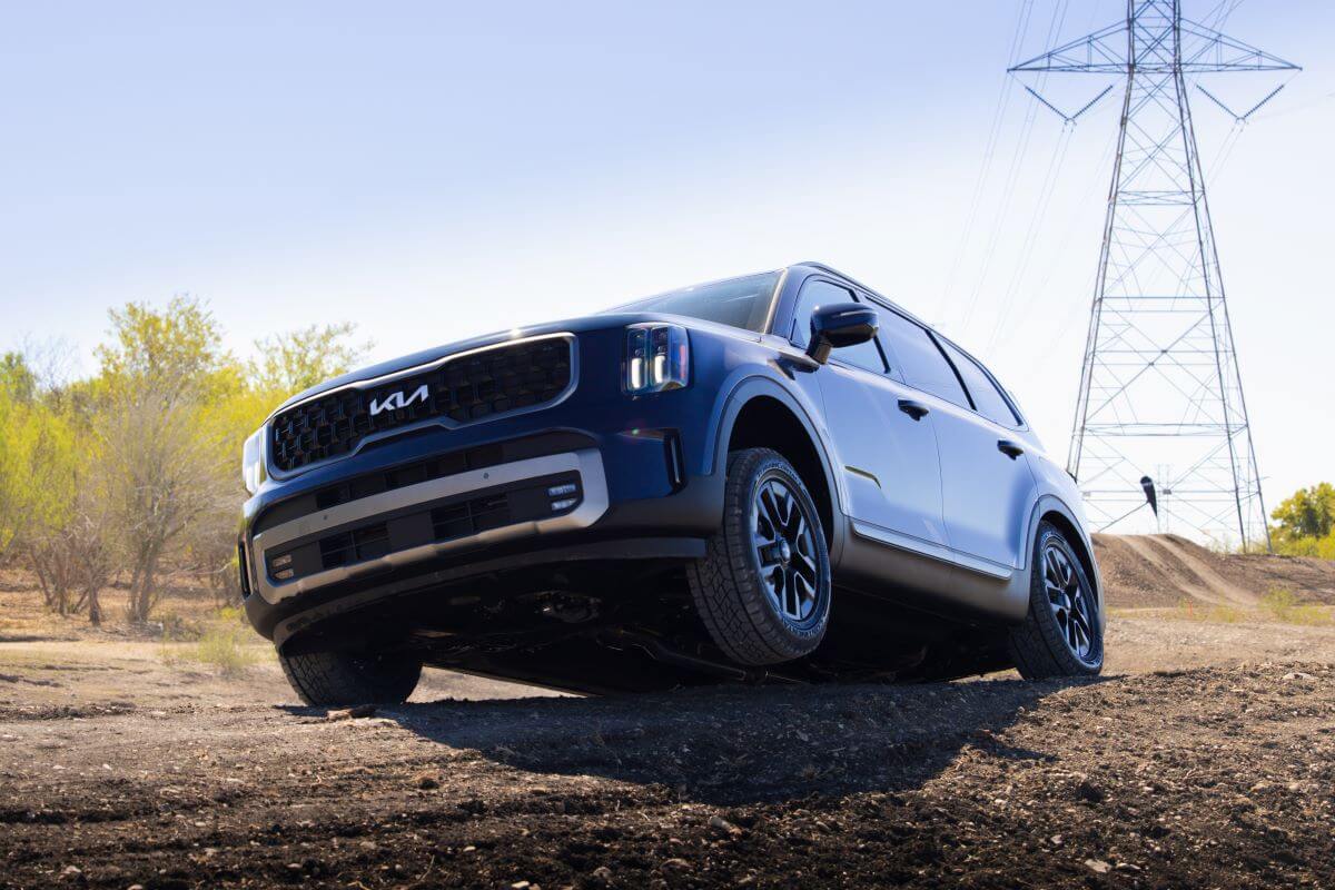 An off-road driving experience with the 2023 Kia Telluride midsize SUV model on dirt trails