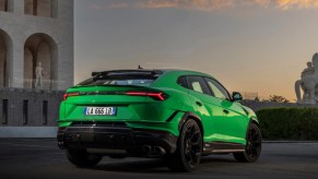The back of a green 2023 Lamborghini Urus.