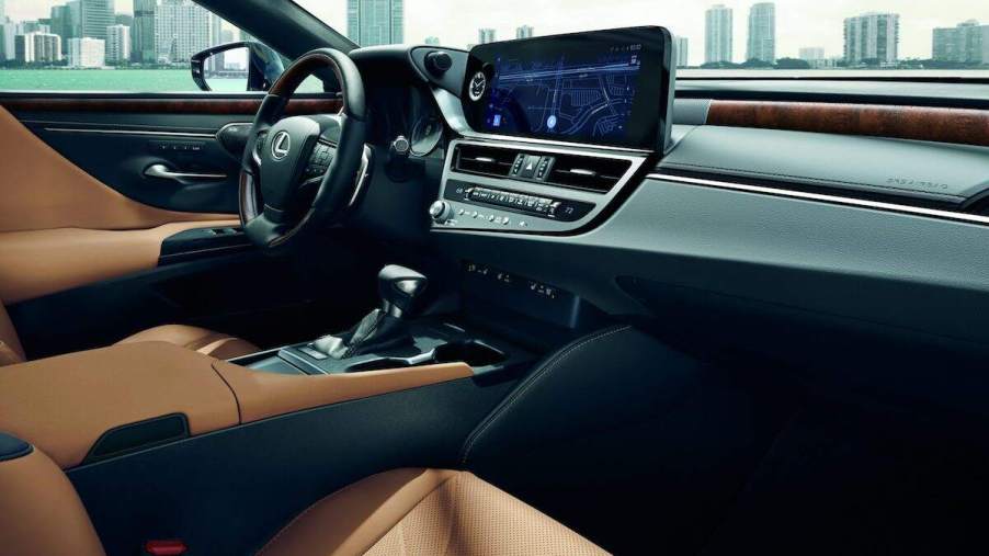 2023 Lexus ES interior view showing features and cup holders in the center console