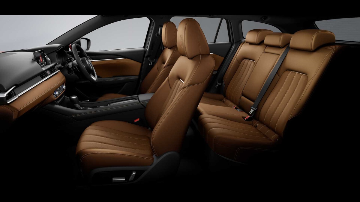 A 2023 Mazda6 interior featuring brown leather throughout