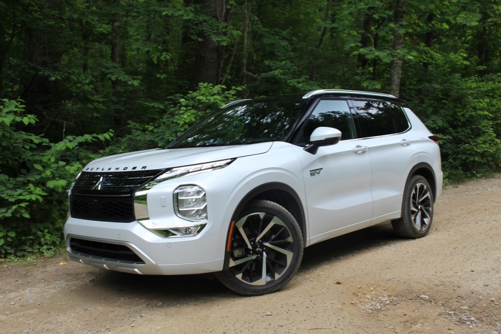 The 2023 Mitsubishi Outlander PHEV off-roading in the woods