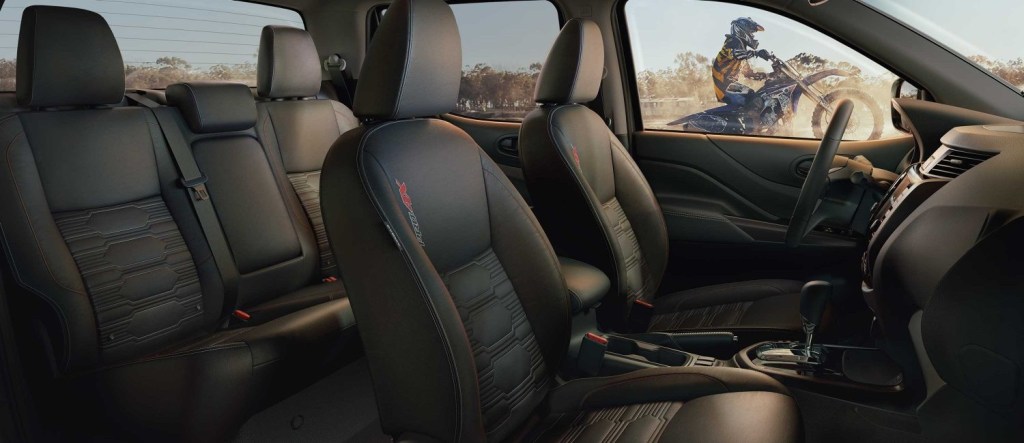 The 2023 Nissan Frontier interior from the side