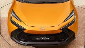 The front of an orange 2023 Toyota C-HR.