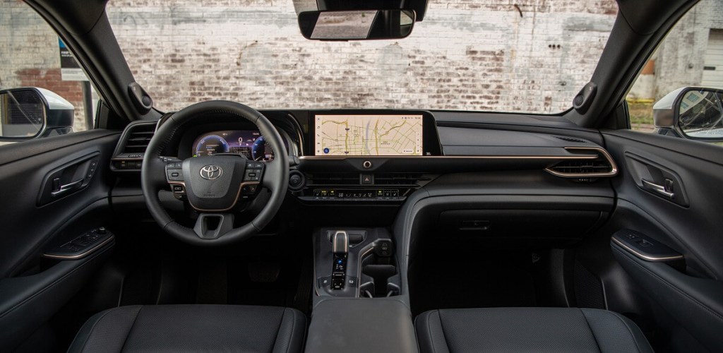 A Crown shows off its interior, a more modern setup than the old 2022 Toyota Avalon. 