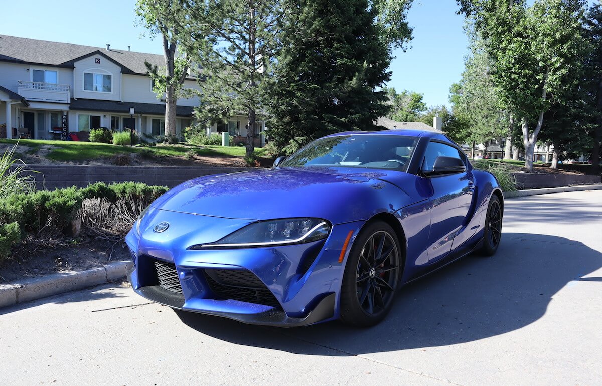 A sports car, like this blue Toyota Supra, is the most expensive type of car to insure